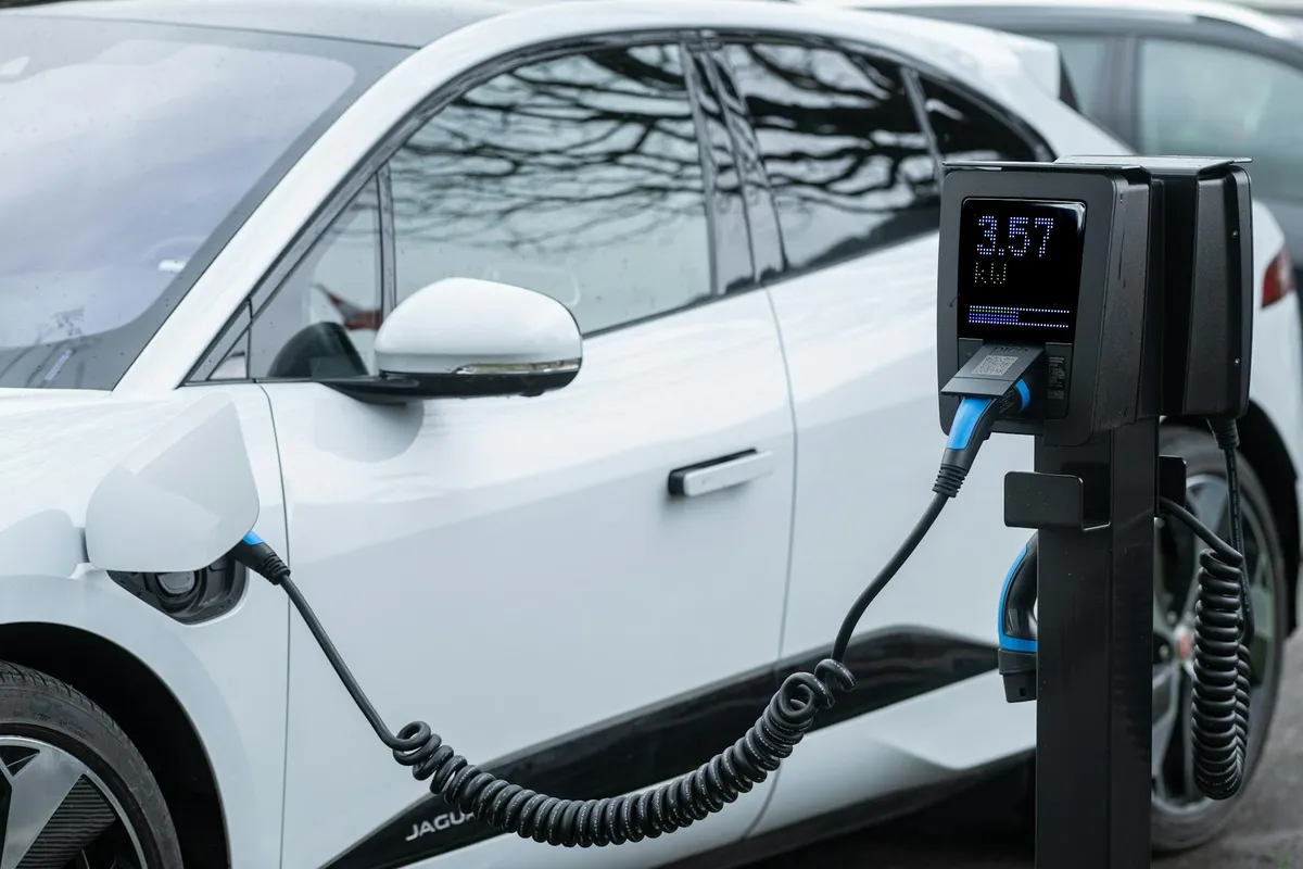 Electric vehicle charging stations at a highway rest area