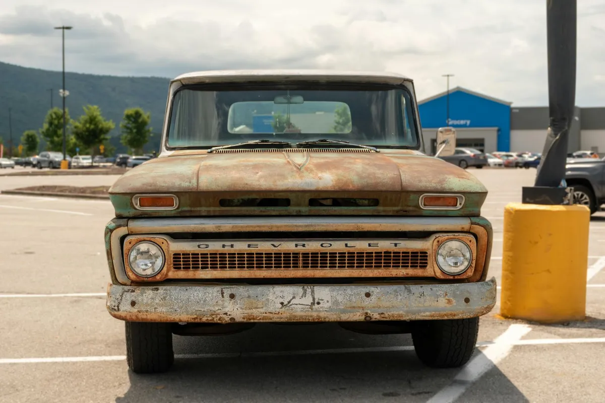 A pickup truck dealership lot with rows of trucks